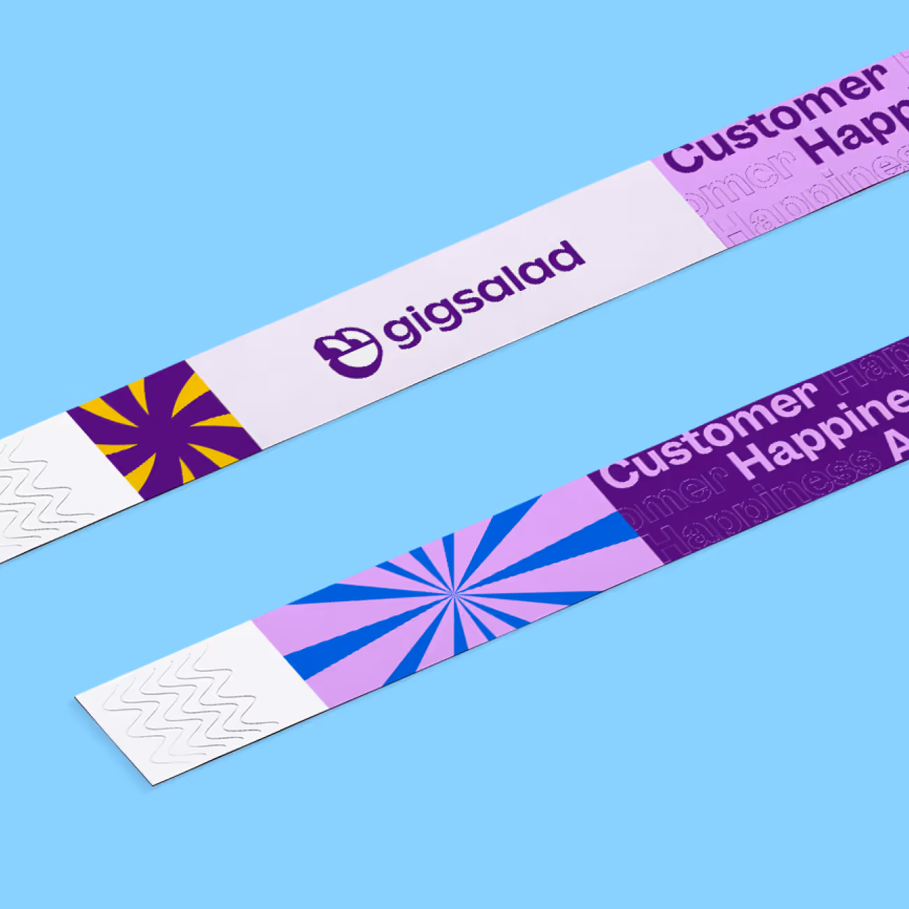 Two colorful event wristbands featuring GigSalad logo and abstract patterns on a light blue background.